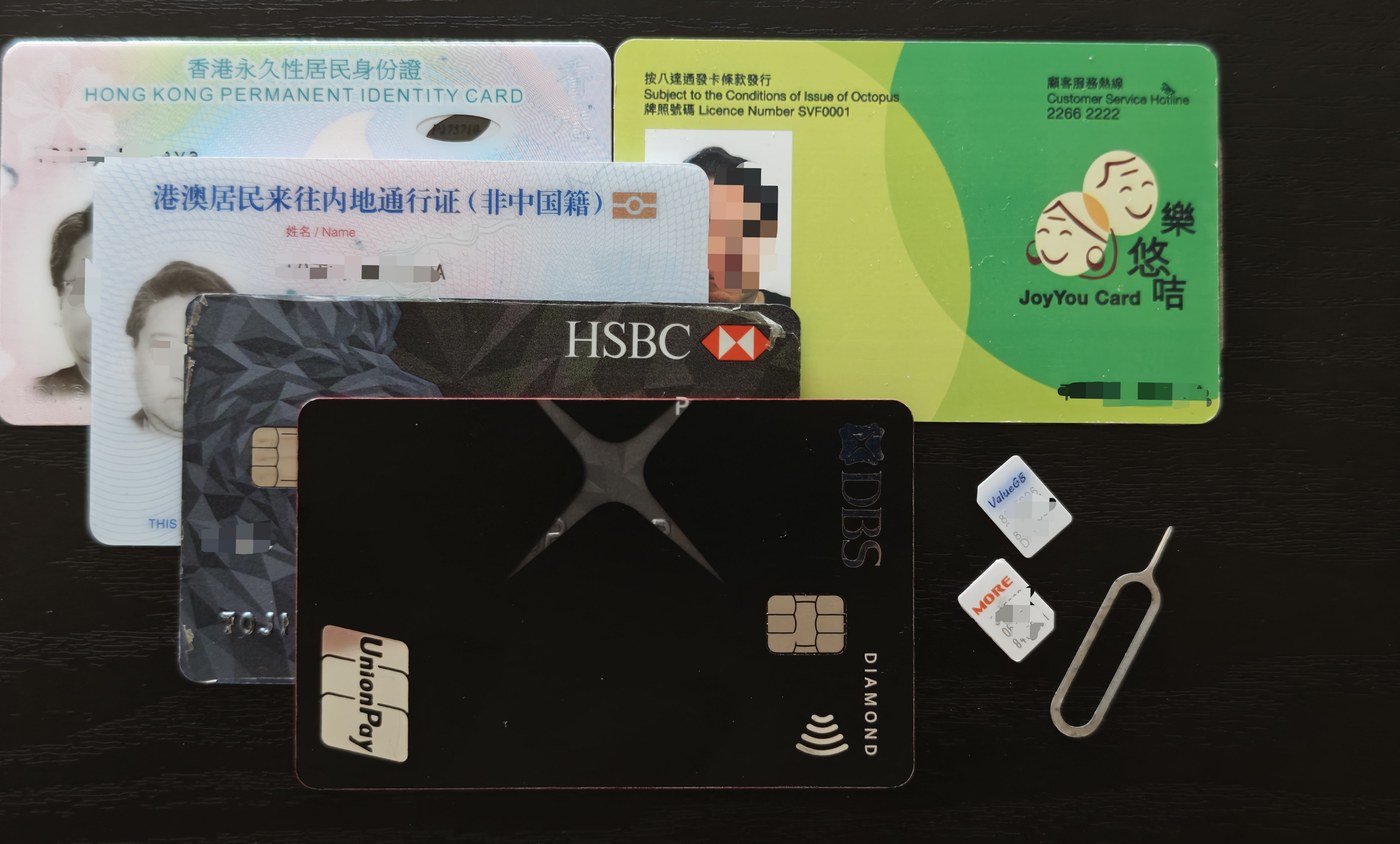 香港での暮らしと出入りに必要なカード一式 — HKID・回郷証・樂悠咭（オクトパス）・銀行カード・SIM