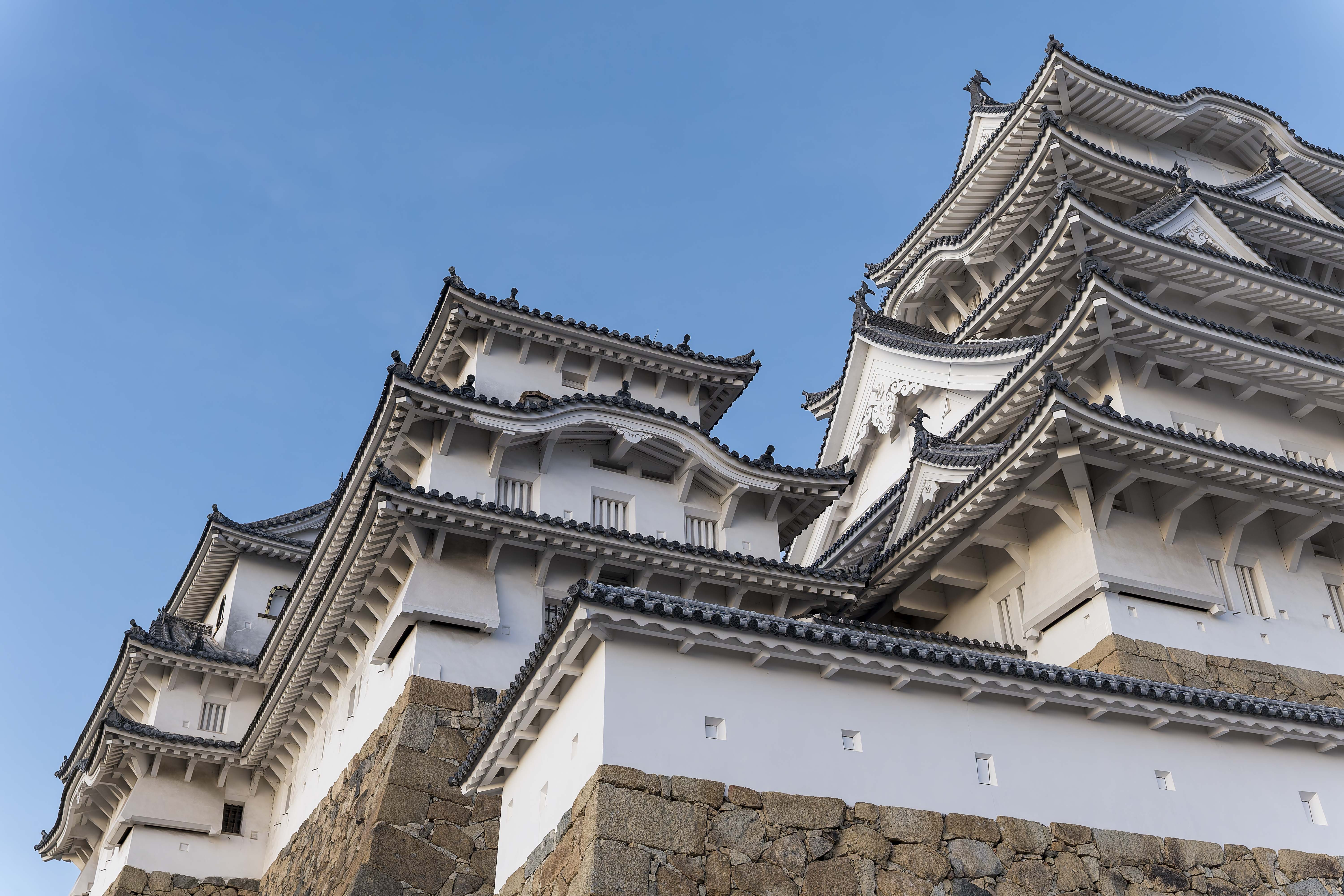 Himeji Castle — View 32: Looking Up at the Blue Sky: A Mountain Range of White Walls (from Bizenmaru, Himeji Castle, spring afternoon)